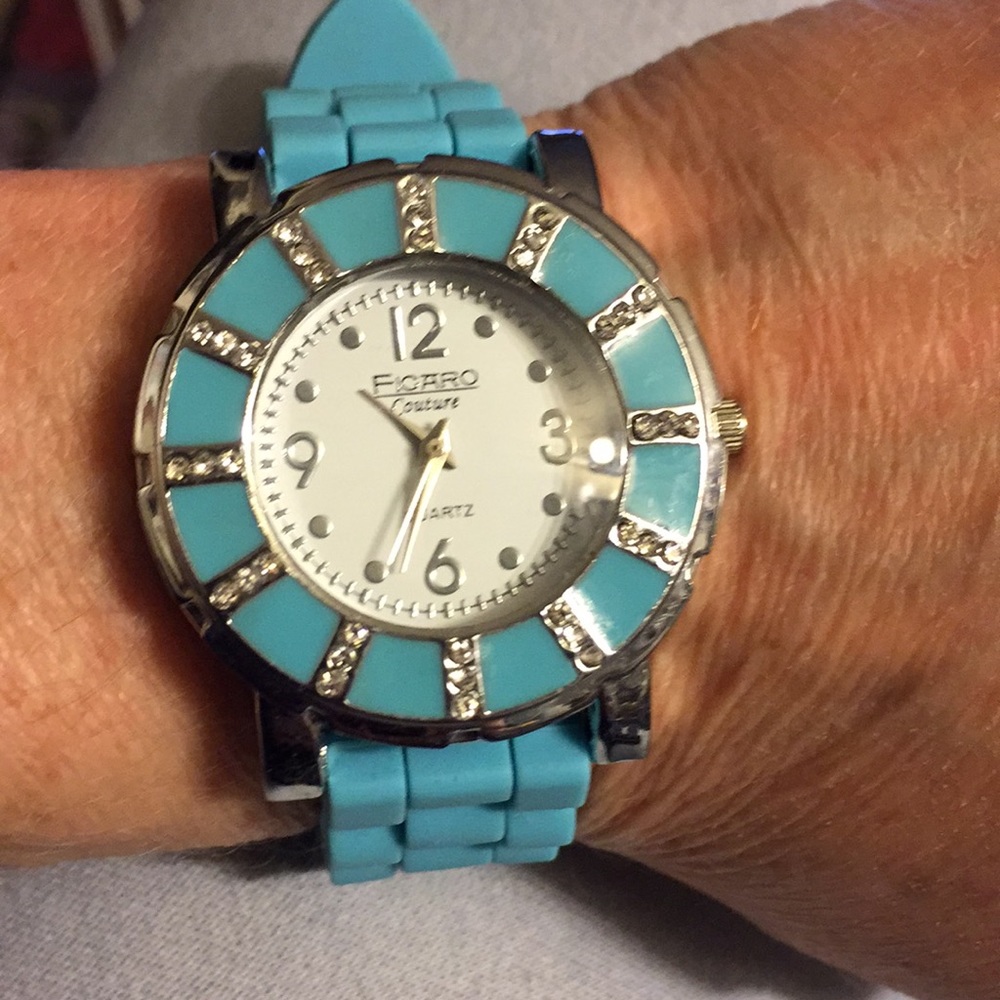 Figaro couture teal colored watch